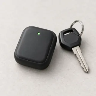 Illustration of a generic motorcycle GPS tracker, not the named model or included accessories